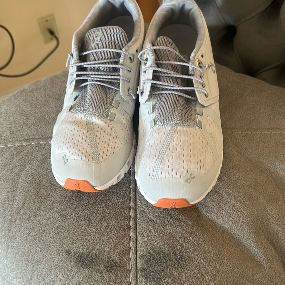 On Running Gray and Orange Athletic Shoes with Breathable Knit